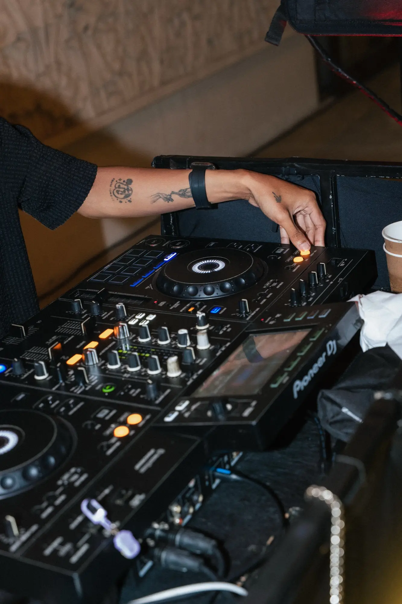 The DJ’s hands on the decks